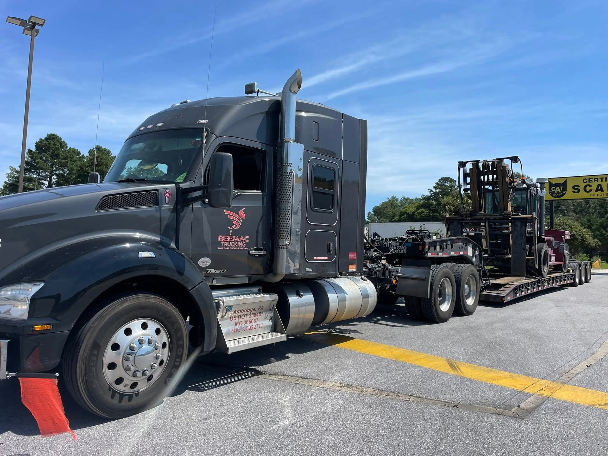 Beemac Trucking flatbed hauling freight for industrial customers